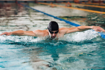 Man Swimming In Pool