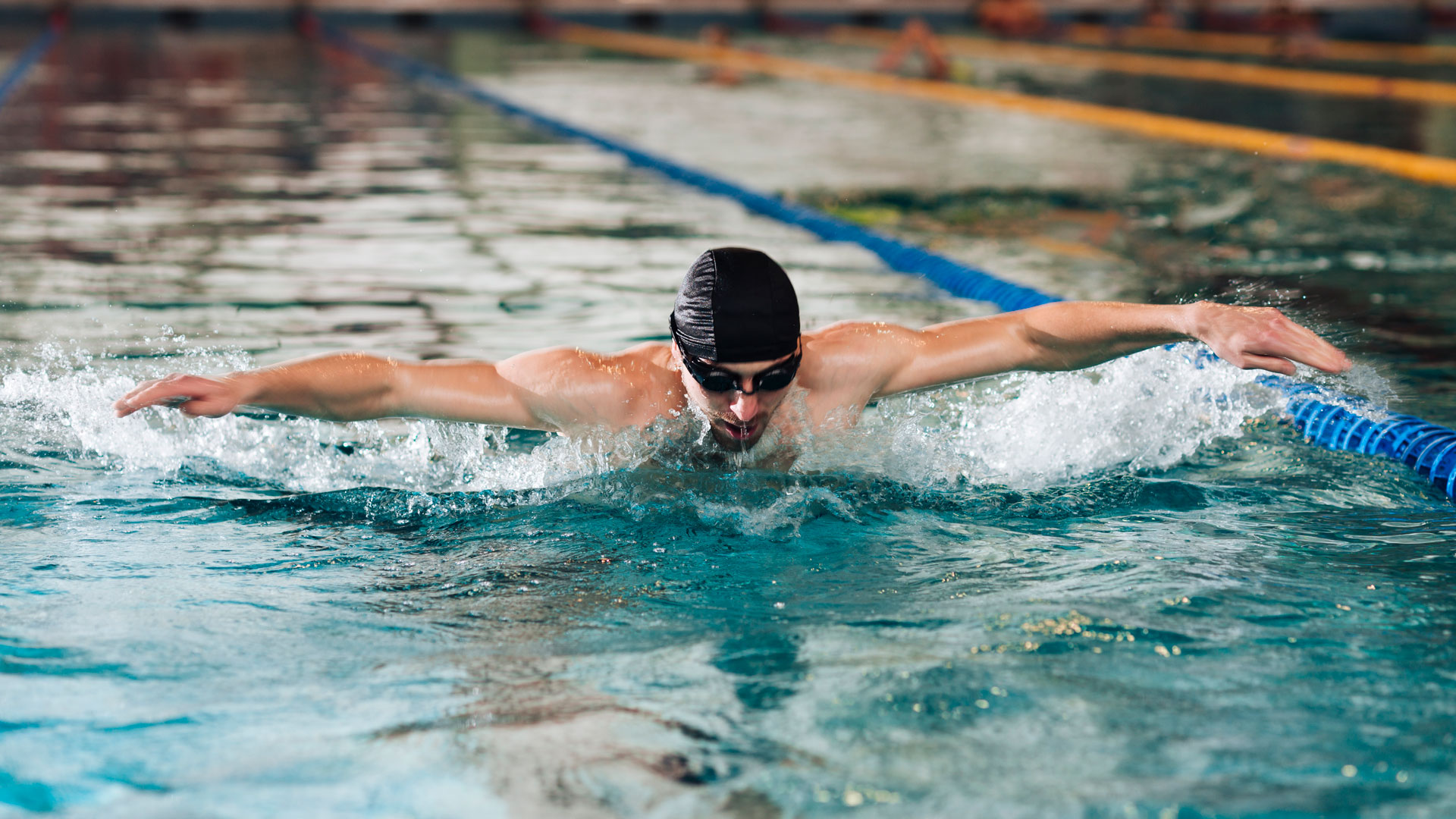 Man Swimming In Pool